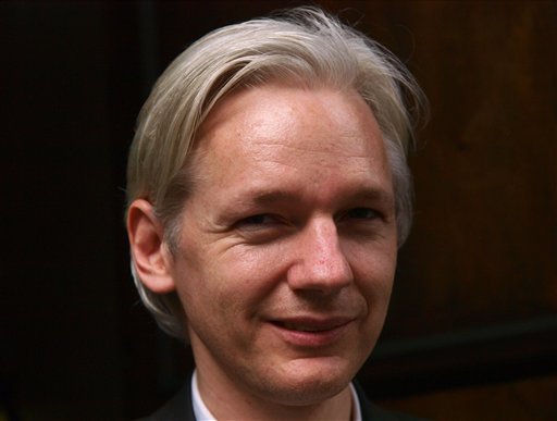 FILE - In this July 27, 2010 file photo, founder and editor of the WikiLeaks website, Julian Assange, speaks to members of the media during a debate event held in London. A Swedish prosecutor has asked for a court order to detain WikiLeaks founder Julian Assange for questioning on suspicions of rape, sexual molestation and unlawful coercion.(AP Photo/Max Nash, File) (Associated Press)