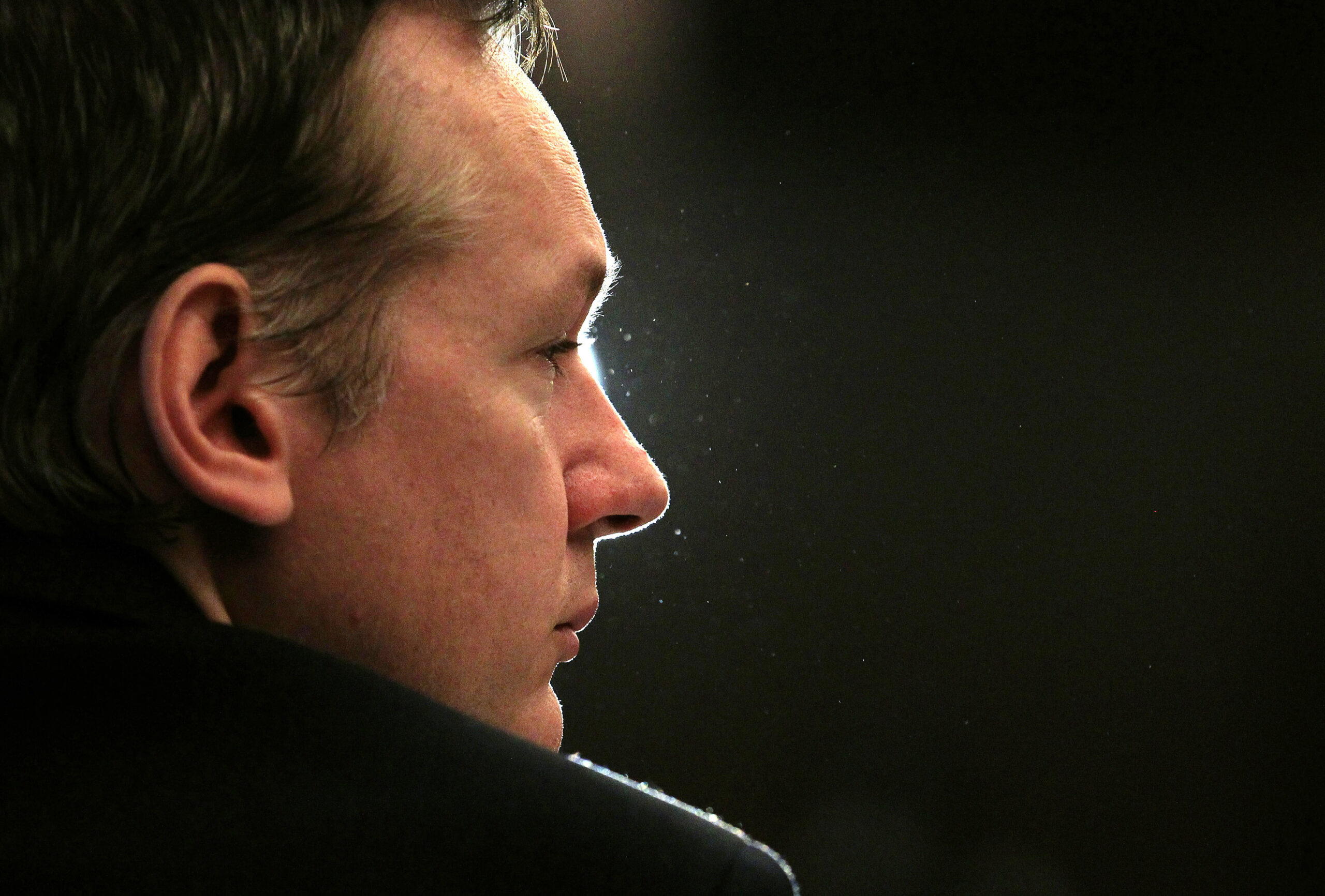 Wikileaks founder Julian Assange listens during a news conference in London in this October 23, 2010 file photo. WikiLeaks founder Julian Assange, arrested in Britain on Swedish allegations of sex crimes, was freed on bail by a British court on December 14, 2010. The 39-year-old Australian, whose website has provoked U.S. fury by publishing some of a trove of 250,000 classified U.S. diplomatic papers, was accused this year of sexual misconduct by two female Swedish WikiLeaks volunteers during a stay in Sweden.  REUTERS/Luke MacGregor/Files (BRITAIN - Tags: MEDIA POLITICS SOCIETY) (Reuters)