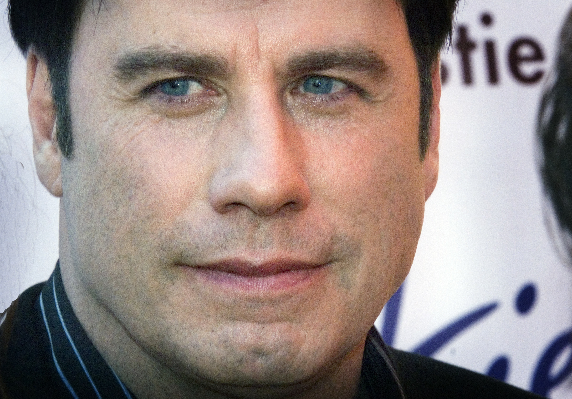 John Travolta listens to reporters questions at a fundraiser for Narconon International in Honolulu, Thursday, May 24, 2007. Travolta's wife, actress Kelly Preston organized the $2,500 a plate dinner to raise funds for the first narconon drug rehabilitation facility on the islands.  (AP Photo/Lucy Pemoni) (Associated Press)
