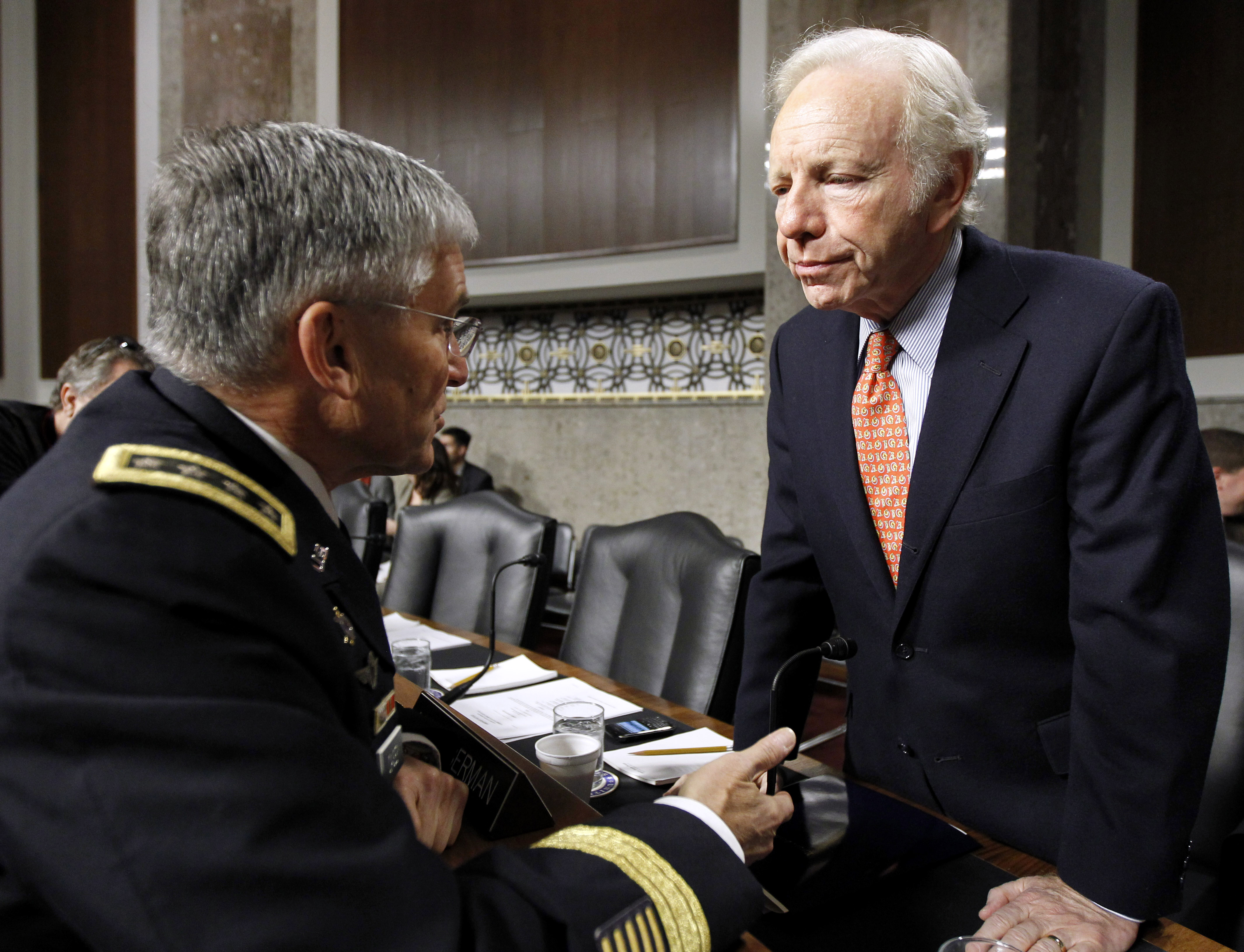 Senate Armed Service Committee Sen. Joseph Lieberman, I-Conn., right, talks with Army Chief of Staff  Gen. George Casey Jr., on Capitol Hill in Washington Friday, Dec. 3, 2010, before the start of the committee's hearing on the military Don't Ask Don't Tell policy. (AP Photo/Alex Brandon) (Associated Press)
