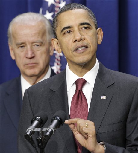 President Barack Obama, joined by Vice President Joe Biden at left, speaks before signing the bipartisan tax package that extends tax cuts for families at all income levels, at the Eisenhower Executive Office Building in the White House complex, Friday, Dec. 17, 2010, in Washington. Aimed at helping to stabilize the recovering economy, the bill keeps in place tax cuts instituted by President George W. Bush for another two years. (AP Photo/J. Scott Applewhite) (AP)