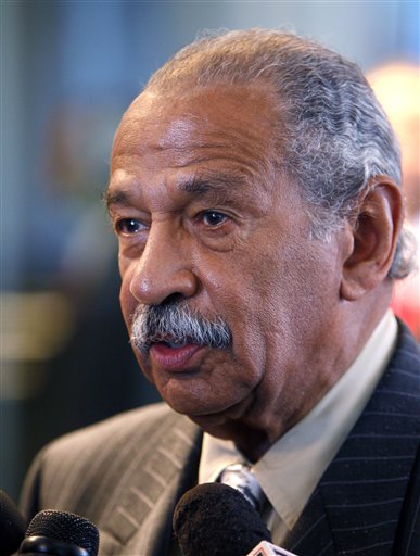FILE - In this Nov. 9, 2009 file photo, Rep. John Conyers, D-Mich., is seen in Detroit. Conyers, the powerful chairman of the U.S. House Judiciary Committee, had his driver's license suspended for a month this summer when a check he used to pay the renewal fee bounced, according to state driving records obtained by The Associated Press. (AP Photo/Carlos Osorio, File) (AP)