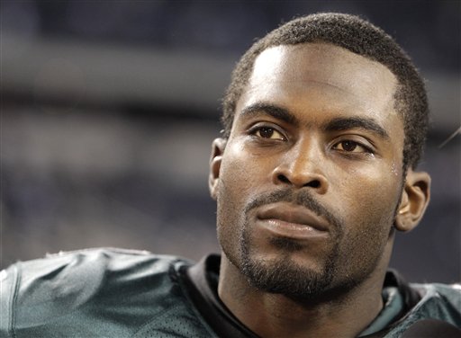 FILE - This Dec. 12, 2010, file photo shows Philadelphia Eagles quarterback Michael Vick after an NFL football game against the Dallas Cowboys,  in Arlington, Texas. The convicted dogfighting-ring operator tells TheGrio.com in a video interview that he genuinely cares for animals and one day hopes to have a dog as a household pet. Vick says it would a "big step" in his rehabilitation process.(AP Photo/LM Otero, File) (AP)