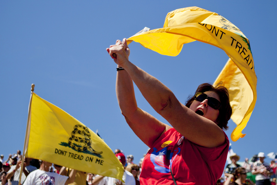Mary Syron, of St. Louis, gathers with other Tea Party supports on the steps of the Gateway Arch during the "Gateway to November" rally hosted by the St. Louis Tea Party and Tea Party Patriots, Sunday, Sept. 12, 2010, in St. Louis. (AP Photo/Whitney Curtis) (Whitney Curtis)