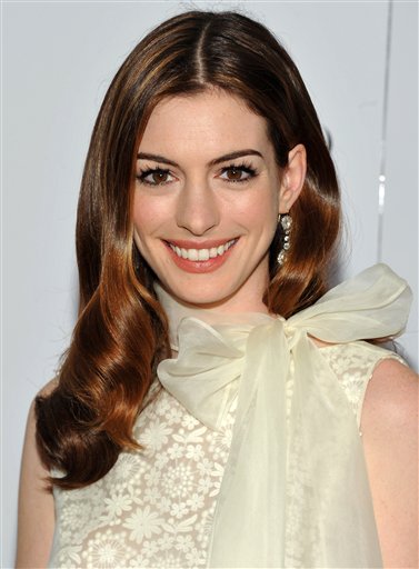 FILE - In this Nov. 16, 2010 file photo, actress Anne Hathaway attends the premiere of "Love and Other Drugs" at the Directors Guild Theater in New York. Hathaway and actor James Franco will serve as co-hosts of the 83rd Academy Awards on Feb. 27, 2011. (AP Photo/Evan Agostini, file) (AP)