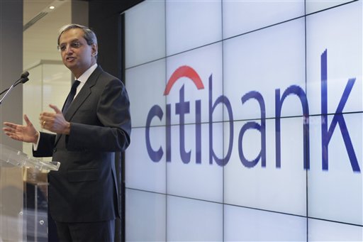FILE - In this file photo taken Dec. 16, 2010, Citigroup CEO Vikram Pandit speaks during Citibank's new high-tech banking center opening in New York's Union Square. Citigroup has reported fourth-quarter earnings of $1.31 billion Tuesday, Jan. 18, 2011, or 4 cents a share, after losses from its loans declined and the bank was able to dip into the reserves it keeps aside for bad loans. (AP Photo/Mary Altaffer, file) (AP)