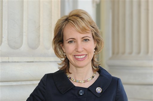 In this March, 2010 photo provided by the office of Rep. Gabrielle Giffords, Giffords poses for a photo. Giffords was critically wounded during a shooting at a political event Saturday, Jan. 8, 2011 in Tucson, Ariz. (AP Photo/Office of Rep. Gabrielle Giffords) (AP)