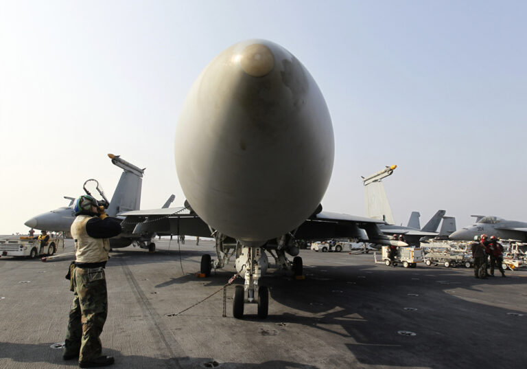 An F/A-18 Hornet fighter jet sits onboard the U.S. Navy's USS George Washington aircraft carrier. (Reuters)