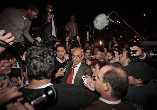 Former Director General of the International Atomic Energy Agency, IAEA, and Nobel Peace Prize winner Mohamed ElBaradei talks to members of the media as he arrives at Cairo's airport in Egypt, from Austria, Thursday, Jan. 27, 2011. ElBaradei told reporters that 'the regime has not been listening.' He urged the Egyptian regime to exercise restraint with protesters, saying they have been met with a good deal of violence which could lead to an 'explosive situation.' (AP Photo/Lefteris Pitarakis) (AP)
