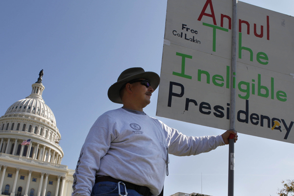 John Balazek of La Plata, Md., attends a rally by the U.S. Capitol in Washington Saturday, Oct. 23, 2010. Participants at the rally, organized under the name of Obama birth certificate rally, call into question the president's eligibility.  (AP Photo/Jacquelyn Martin) (Jacquelyn Martin)