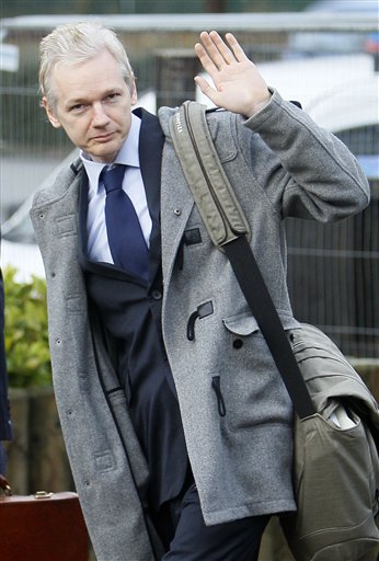 WikiLeaks founder Julian Assange arrives at Belmarsh Magistrate's court in London for his extradition hearing, Tuesday, Jan. 11, 2011. (AP Photo/Alastair Grant) (AP)