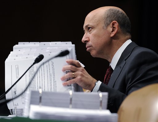 FILE - In this April 27, 2010  file photo, Goldman Sachs chairman and chief executive officer Lloyd Blankfein testifies before the Senate Subcommittee on Investigations hearing on Wall Street investment banks and the financial crisis on Capitol Hill in Washington. In response to widespread criticism over its practices, Goldman Sachs Group Inc. Tuesday, Jan. 11, 2011, released an internal report that makes recommendations on how it can be more transparent about its business practices. (AP Photo/Susan Walsh, File) (AP)