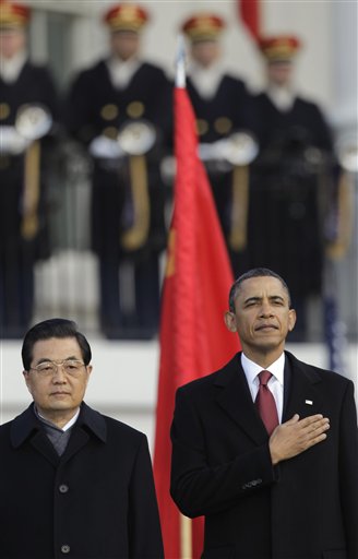 President Barack Obama welcomes China's President Hu Jintao during a state arrival on the South Lawn of the White House in Washington, Wednesday, Jan. 19, 2011. (AP Photo/Charles Dharapak) (AP)