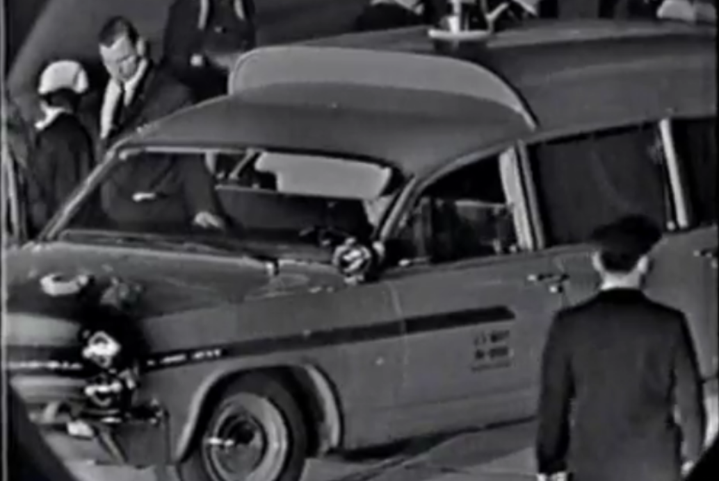 A shot of the Navy ambulance just after John F. Kennedy's body was moved from Air Force One to the vehicle.
