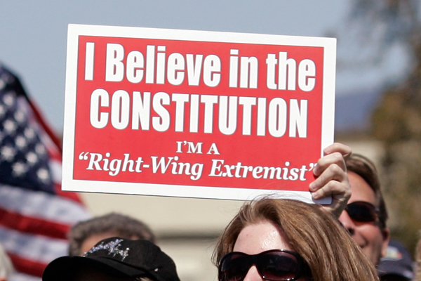 Detail of a sign signs during a Tax Day Tea Party demonstration in Pleasanton, Calif., Wednesday, April 15, 2009