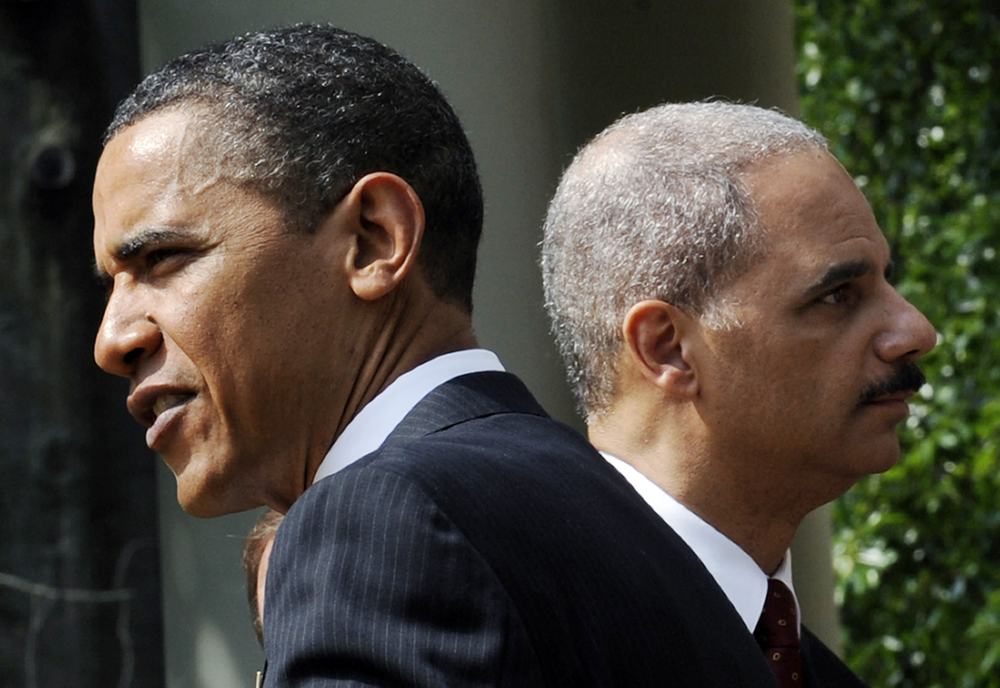 President Barack Obama and Attorney General Eric Holder in the Rose Garden of the White House in Washington while meeting with the 2010 National Association of Police Organizations award winners, Friday, May 14, 2010. (AP Photo/Susan Walsh) (Associated Press)