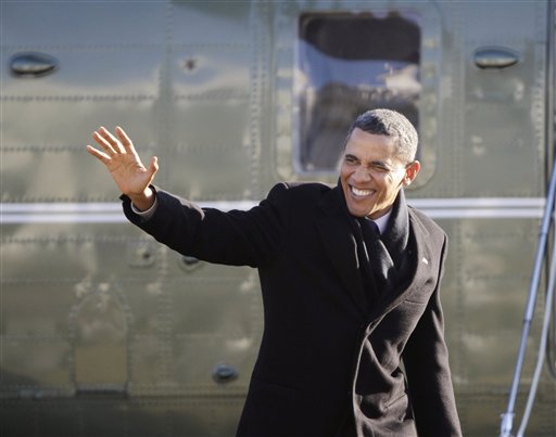 President Barack Obama waves as he arrives on the South Lawn of the White House in Washington, Friday, Jan. 21, 2011,  from a trip to Schenectady, N.Y. (AP Photo/Pablo Martinez Monsivais) (AP)