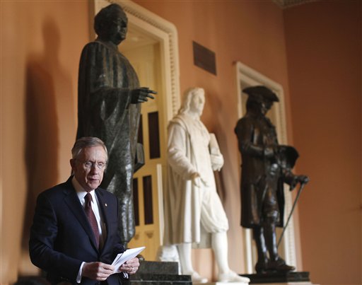 Senate Majority Leader Harry Reid of Nev. leaves the Democratic caucus luncheon to speak to reporters on Capitol Hill in Washington, Thursday, Jan. 6, 2011. (AP Photo/Charles Dharapak) (AP)