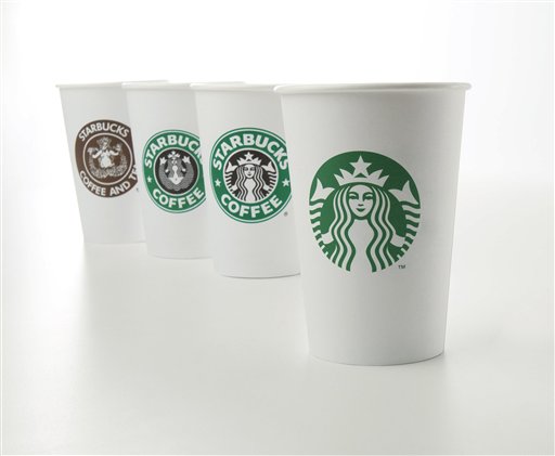 In this undated product image provided by Starbucks, the company's new 40-year anniversary logo is seen on a cup at right.  Other cups bearing the company's logo from over the years, from left, 1971, 1987, and 1992, are also shown. (AP Photo/Starbucks) NO SALES (AP)