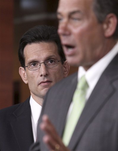 FILE - In this Jan. 20, 2010 file photo, House Minority Whip Eric Cantor of Va., left, listens As House Minority Leader John Boehner of Ohio speaks during a news conference on Capitol Hill in Washington. Republican leaders, ever more confident of their chances of winning control of the House and possibly the Senate, have begun plotting a 2011 agenda topped by a push for eye-popping spending cuts and attempts to undo key parts of President Barack Obama's health care and financial regulation laws.  (AP Photo/Lauren Victoria Burke, File) (AP)