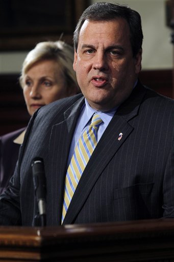 New Jersey Lt. Gov. Kim Guadagno looks on as Gov. Chris Christie answers a question Wednesday, Nov. 3, 2010, in Trenton , N.J. Christie has emerged as a star campaigner for Republicans across the nation. He says he's not interested in running for president in 2012, but some analysts say his behavior indicates otherwise. (AP Photo/Mel Evans) (AP)