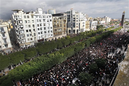 Protesters chant slogans against President Zine El Abidine Ben Ali  during a demonstration in Tunis, Friday, Jan. 14, 2011. Thousands of angry demonstrators marched through Tunisia's capital Friday, demanding the resignation of the country's autocratic leader a day after he appeared on TV to try to stop deadly riots that have swept the North African nation. (AP Photo/Christophe Ena) (AP)