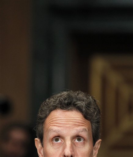 FILE - In this Dec. 16, 2010, file photo Treasury Secretary Timothy Geithner testifies on Capitol Hill in Washington before the Congressional Oversight Panel hearing on TARP. The United States just passed a dubious milestone: Government debt surged to an all-time high, more than $14 trillion. Geithner says failure to increase borrowing authority would be "a catastrophe," perhaps rivaling the financial meltdown of 2008-2009.  (AP Photo/Alex Brandon, File) (AP)