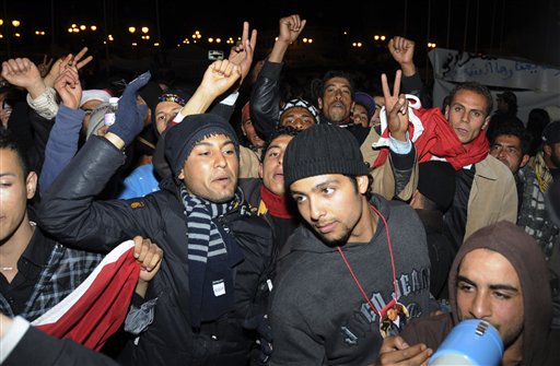 Tunisian protestors, staging an overnight protest, demonstrate in front of the prime minister office in Tunis last year. (AP Photo/Hassene Dridi)