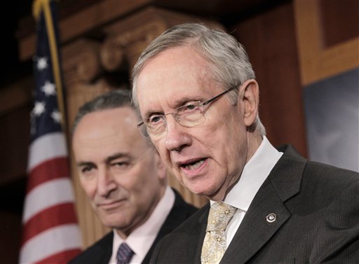 Senate Majority Leader Harry Reid of Nev., accompanied by Sen. Charles Schumer, D-N.Y., speaks during a news conference on Capitol Hill in Washington, Tuesday, Feb. 2, 2011, to respond to Republican critics on health care and the aviation bill. (AP Photo/J. Scott Applewhite) (AP)