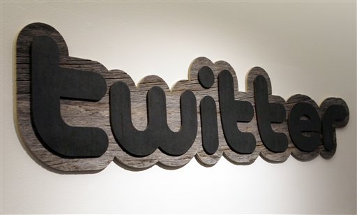 FILE - In this June 23, 2010 file photo, a Twitter sign hangs at the offices of Twitter Inc., in San Francisco. WikiLeaks said Saturday, Jan. 8, 2011 that U.S. investigators have gone to San Francisco-based Twitter Inc. to demand the private messages, contact information and other personal details of Julian Assange and three people associated with the secret-spilling website. The popular micro-blogging site has declined comment. (AP Photo/Jeff Chiu, File) (AP)