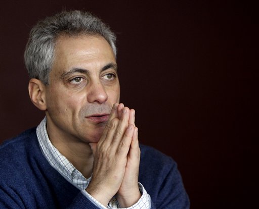 Chicago mayoral candidate Rahm Emanuel talks to reporters during an interview at 42 degrees North Latitude coffee shop in Chicago, Saturday, Feb. 12, 2011. (AP Photo/Nam Y. Huh) (AP)