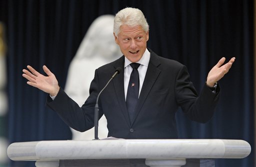 Former President Bill Clinton speaks during the funeral mass for R. Sargent Shriver at Our Lady of Mercy Parish in Potomac, Md., Saturday, Jan. 22, 2011.  Shriver, an in-law of the Kennedys, and the first director of the Peace Corps, died Tuesday. He was 95. (AP Photo/Cliff Owen/Pool) (AP)