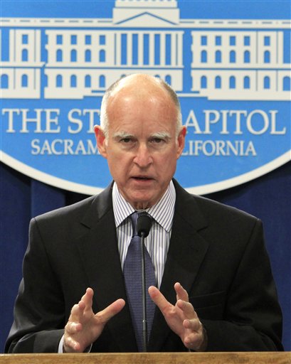 Gov. Jerry Brown announces that he is dropping a plan by former Gov. Arnold Schwarzengger to sell 24 state government buildings to private investors, during a Capitol news conference, in Sacramento, Calif., Wednesday, Feb. 9, 2011.  Brown said the plan to sell the buildings, for $2.3 billion and them  rent them back, didn't make any sense because of  the high cost of the rent. (AP Photo) (AP)