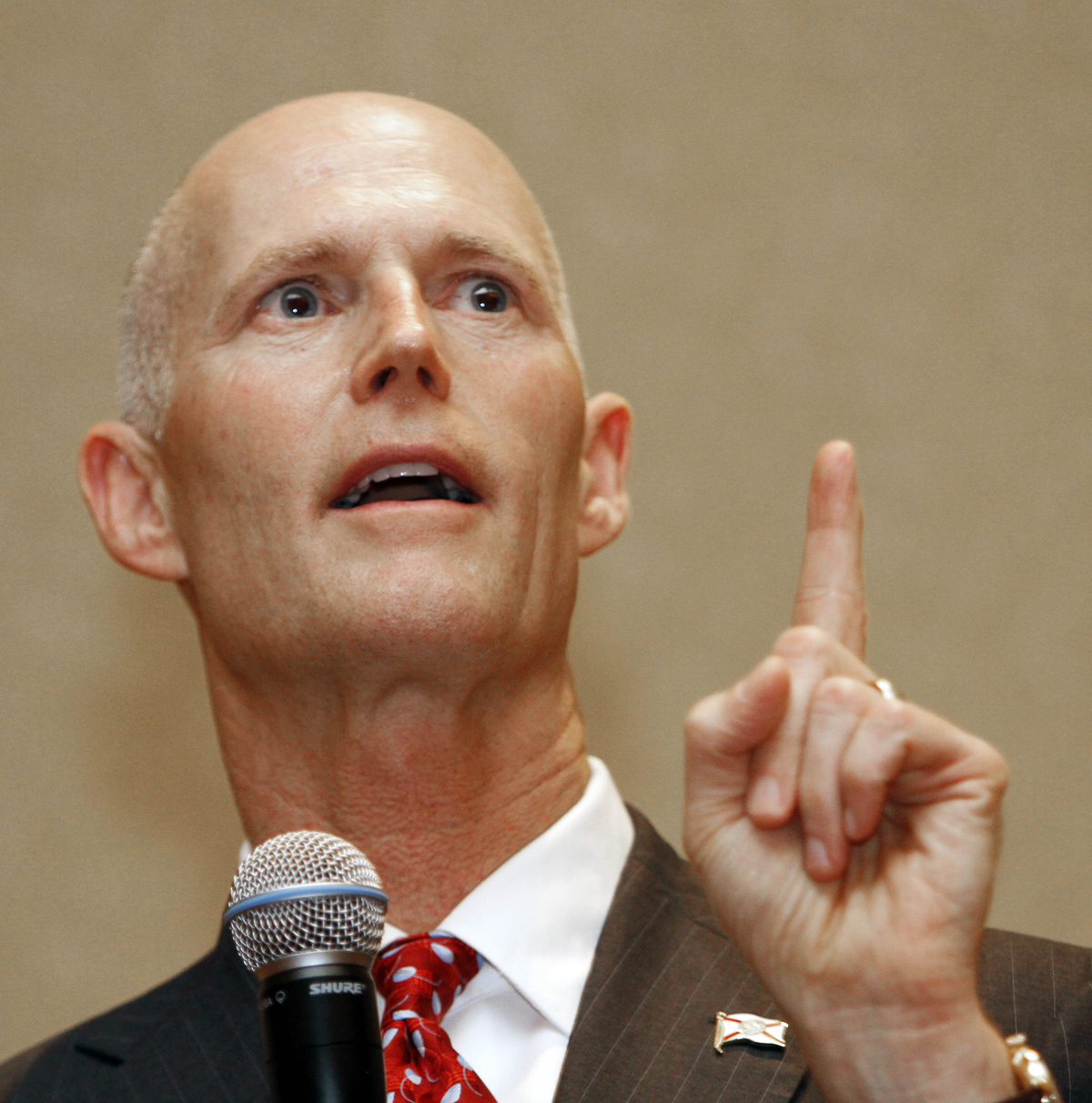 Gov. Rick Scott gestures during a  business conference in Hollywood, Fla., Friday, Feb. 4, 2011. (AP Photo/Alan Diaz)