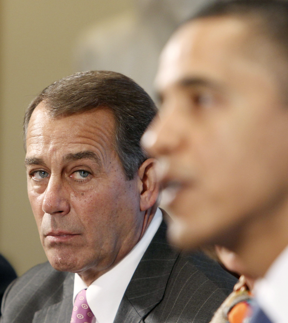 House Minority Leader John Boehner (L) listens to U.S. President Barack Obama talk with bipartisan leaders of the House and the Senate about the economy in the Cabinet Room of the White House in Washington, February 9, 2010.    REUTERS/Larry Downing  (UNITED STATES - Tags: POLITICS) (Â© Larry Downing / Reuters)