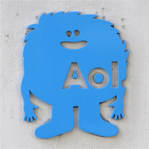 A small AOL placard is displayed on their offices in New York, Monday, Feb. 7, 2011. Internet company AOL Inc. is buying news hub Huffington Post in a $315 million deal that represents a bold bet on the future of online news. (AP Photo/Seth Wenig) (AP)