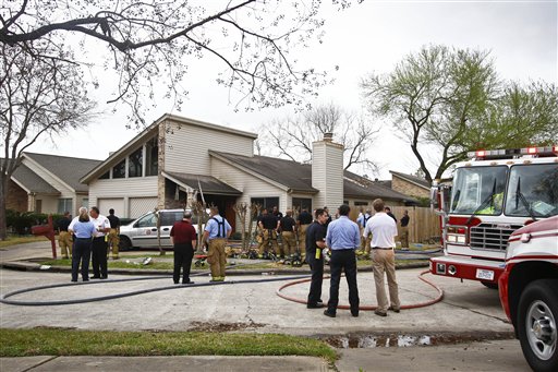 Emergency Personnel respond to the location where a fire broke out at a day care operated by Jessica Tata, 22,  lkilling three children and injuring four others Thursday, Feb. 24, 2011, in Houston. (AP Photo/Houston Chronicle, Michael Paulsen) MANDATORY CREDIT (AP)
