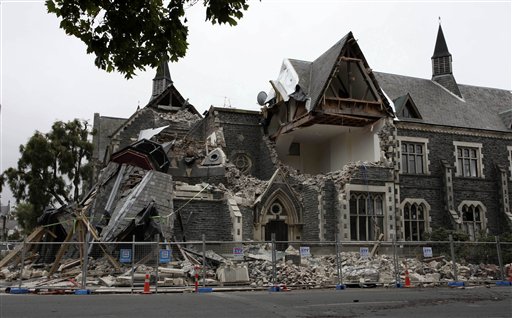 A building in Christchurch, New Zealand, is destroyed after an earthquake struck Tuesday, Feb. 22, 2011. The 6.3-magnitude quake collapsed buildings and is sending rescuers scrambling to help trapped people amid reports of multiple deaths. (AP Photo/NZPA, Pam Johnson) NEW ZEALAND OUT, NO ARCHIVES, NO SALES (AP)