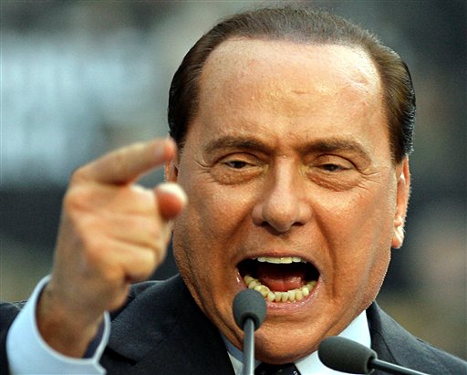 Former Italian premier Silvio Berlusconi at a speech in Milan, Italy on September 27, 2009. (AP Photo/Alberto Pellaschiar)