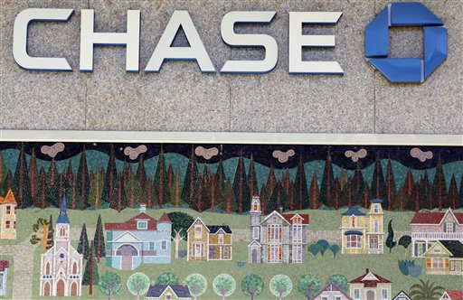 In this photo taken Jan. 5, 2011, a mural of a small town is shown at Chase bank in Santa Cruz, Calif. JPMorgan Chase & Co. (NYSE: JPM) today reported fourth-quarter 2010 net income of $4.8 billion, an increase of 47% compared with $3.3 billion for the fourth quarter of 2009.  (AP Photo/Paul Sakuma) (AP)