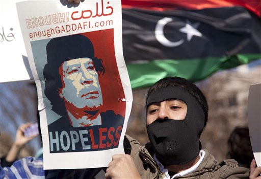 Demonstrators gather near the White House in Washington in a show of solidarity with the Libyan protestors on Saturday, Feb. 19, 2011.  Moammar Gadhafi's forces fired on mourners leaving a funeral for protesters Saturday in the eastern city of Benghazi, killing at least 15 people and wounding scores more as the regime tried to squelch calls for an end to the ruler's 42-year grip on power.  (AP Photo/Evan Vucci) (AP)