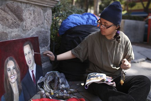 Estibalis Chavez paints a portrait of Britain's Prince William and Kate Middleton in front of the British Embassy in Mexico City, Friday Feb. 18, 2011.  Chavez, 19, who says she has a childhood dream to attend a royal wedding, claims she has been on a hunger strike for nine days and will continue her fast camped out in front of the embassy until she gets an invitation to attend the royal wedding of William and Kate.  According to a statement from the British embassy in Mexico, Buckingham Palace is aware of Chavez's hunger strike but no invitation will be extended to her. (AP Photo/Alexandre Meneghini) (AP)