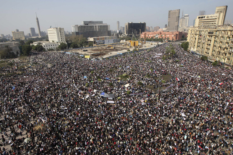 The crowd gathers in Tahrir, or Liberation, Square in Cairo, Egypt, Tuesday, Feb. 1, 2011. Tens of thousands of people flooded into the heart of Cairo Tuesday, filling the city's main square as a call for a million protesters was answered by the largest demonstration in a week of unceasing demands for President Hosni Mubarak to leave after nearly 30 years in power. (AP Photo/Khalil Hamra) (Khalil Hamra)