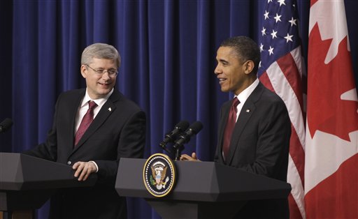President Barack Obama and Canada's Prime Minister Stephen Harper take part in a joint news conference, Friday, Feb. 4, 2011, in the Eisenhower Executive Office Building on the White House complex in Washington. (AP Photo/Charles Dharapak) (AP)