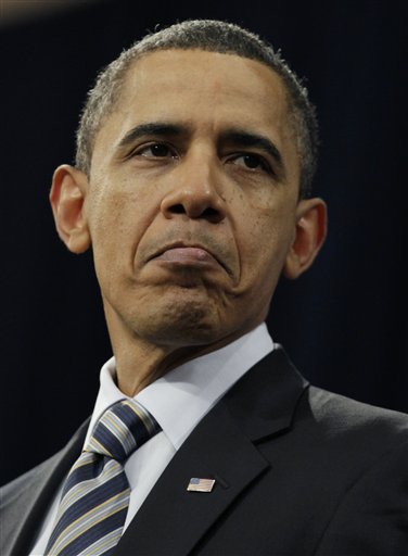 President Barack Obama pauses as he speaks at Northern Michigan University, Thursday, Feb. 10, 2011, in Marquette, Mich.  (AP Photo/Carolyn Kaster) (AP)