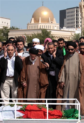 Mourners pray during the funeral for Fadhel Salman al-Matrook on Wednesday, Feb. 16, 2011, in Manama, Bahrain. Al-Matrook was killed Tuesday when police tried to stop a funeral march for another Bahraini killed in anti-government protests. Protesters demanding sweeping political reforms from Bahrain's rulers held their ground Wednesday in an Egypt-style occupation of the capital's landmark square, staging a third day of demonstrations that have brought unprecedented pressures in one of Washington's most strategic allies in the Gulf. (AP Photo/Hasan Jamali) (AP)