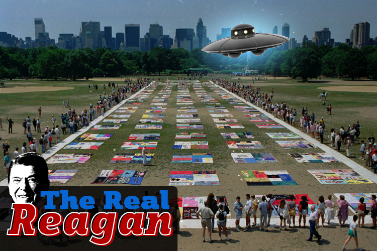 Onlookers watch as almost 1,500 quilt panels bearing the names of New York area residents who have died of AIDS are unfolded on the Great Lawn in New York's Central Park Saturday, June 25, 1988.