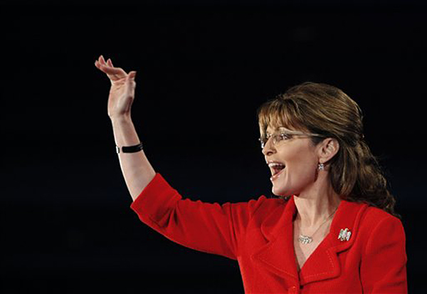 Sarah Palin waves as she arrives to speak at the Southern  Republican Leadership Conference in New Orleans, Friday, April 9, 2010. (AP Photo/Gerald Herbert) (Gerald Herbert)