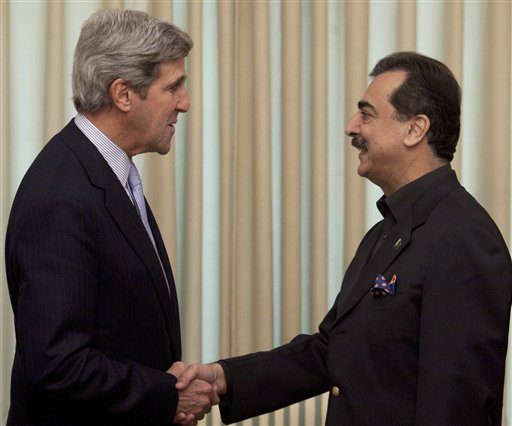 U. S. Senator John Kerry, left, meets Pakistan's Prime Minister Yousuf Raza Gilani in Islamabad, Pakistan on Wednesday, Feb. 16, 2011. Kerry's meeting with Pakistani officials is an indication that the American politician may have a rocky time convincing Pakistan to free a U. S. consulate employee Raymond Davis, allegedly involved in shooting of two Pakistanis.(AP Photo/B.K.Bangash) (AP)
