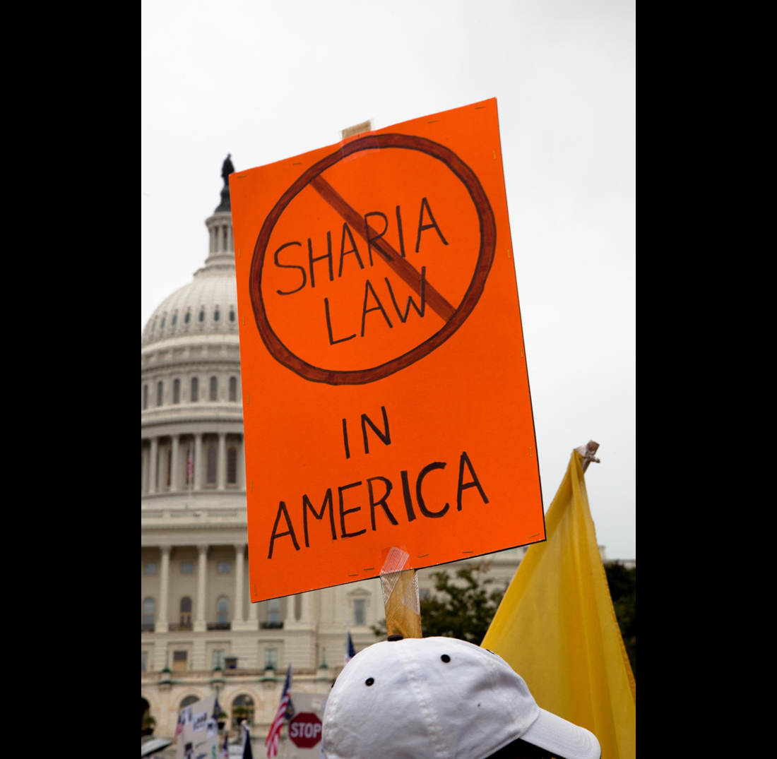 Home made signs, some with anti-Muslem themes, were abundant as Tea Partiers gather around the West Lawn of the US Capitol in Washington DC for a second 9/12 rally on September 12, 2010. (Photo by Jeff Malet) (Jeff Malet)